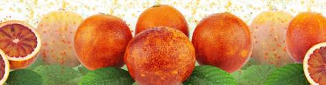 Изображение для скинали: Спелые красные апельсины с разрезом и зелеными листьями